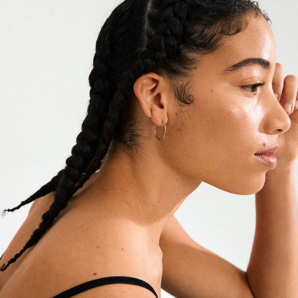 Between Gold Plated Hoops